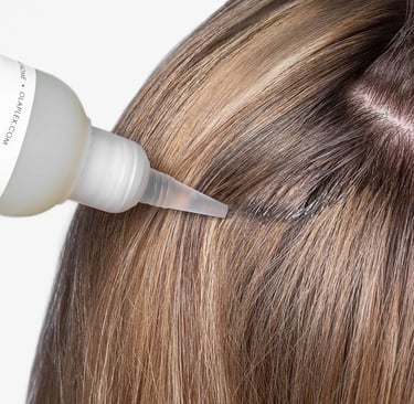 Hair model with Olaplex product