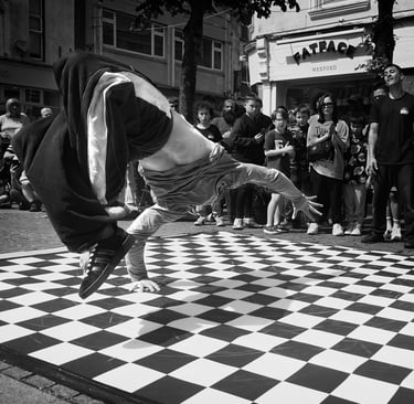 Breakdancer doing backflip.