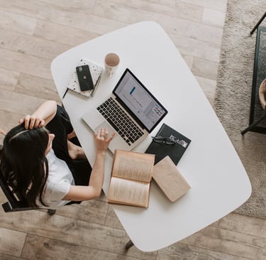 woman working from home remote laptop cellphone seo