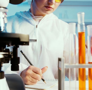 a woman in a lab coat and goggles