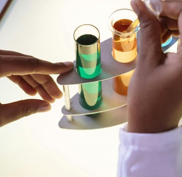 a person holding a tray with a tray of liquid