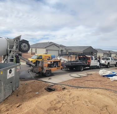 a cement mixer truck is parked in a lot