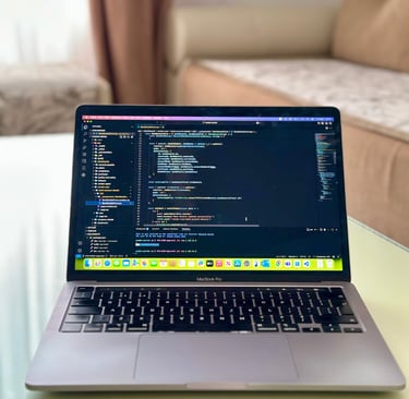 My MacBook Pro M2 with VSCode running NextJS dark theme on a couch in a sunny living room