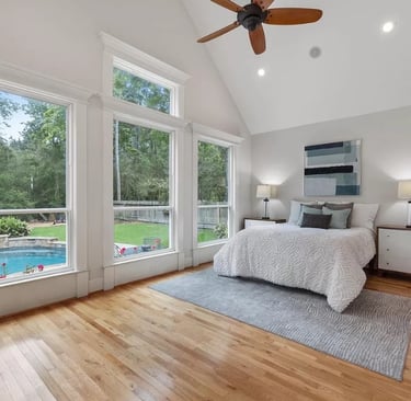 Gorgeous view of Primary bedroom with pool view