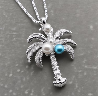a close up of a necklace on a wooden plate