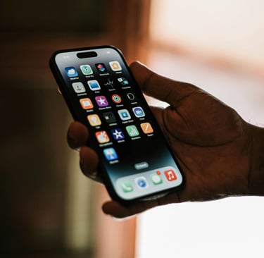 An iPhone screen on someone's hand