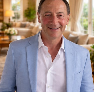 Stephen Williamson standing in a hotel lounge.