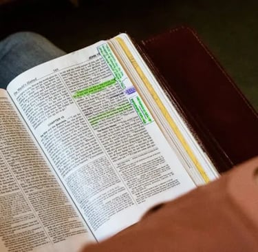 An Open Bible worn by personal study of God's Word