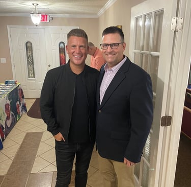 Joseph Habedank and Joe Moseley pose for picture at church