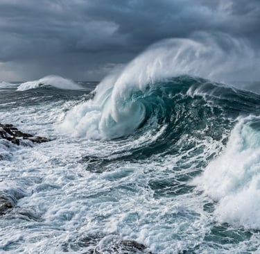 picture of ocean waves crashing over rocks