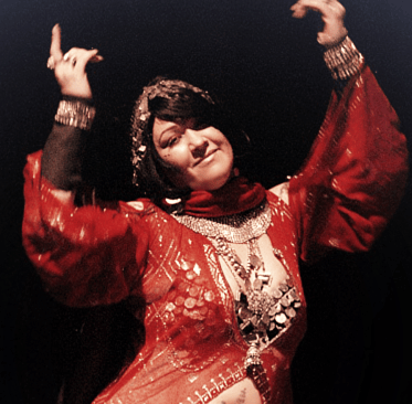 Bellydance Shahravar in modern red assuit dress from Egypt