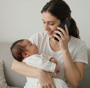 man kissing baby's feet