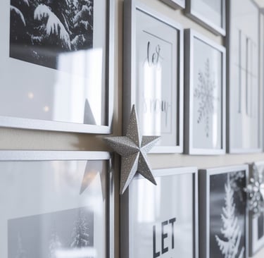 a wall of framed pictures of a starfish