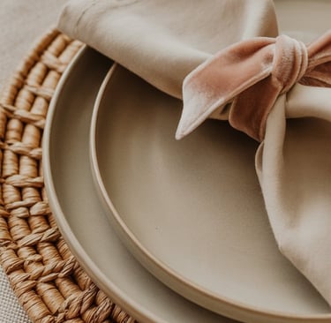 a plate with a napkin and a napkin