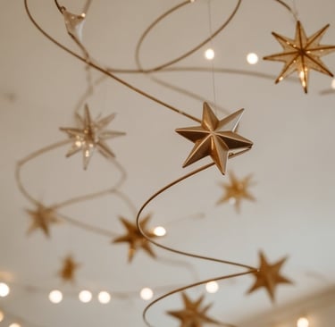 a bunch of stars hanging from a ceiling