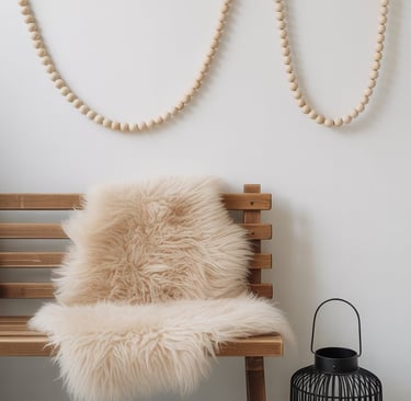 a bench with a fur rug and a wooden bench with a lamp
