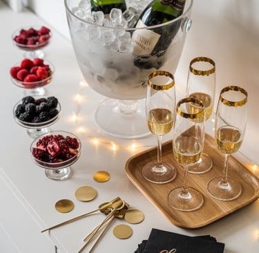 a table with champagne flutest and champagne flutest