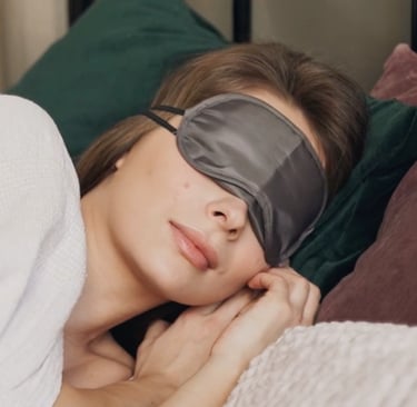 sleeping woman with blinders on