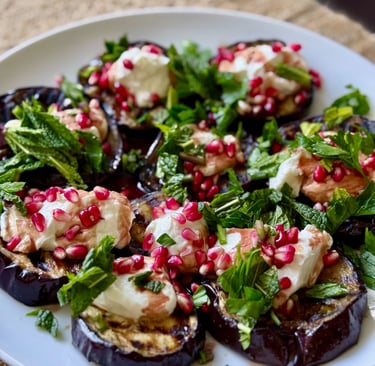 Pomegranate Topped Roasted Eggplant with Yogurt & Fresh Mint