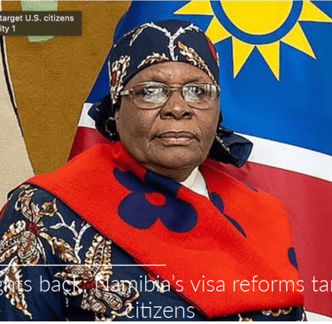 a woman in a red dress and a blue and white flag