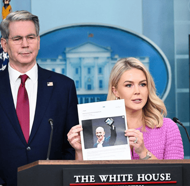 a man and woman standing in front of a podium
