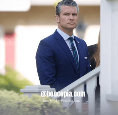 a man in a suit and tie standing on a balcony