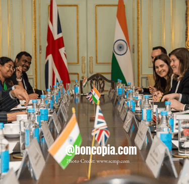 a group of people sitting around a table