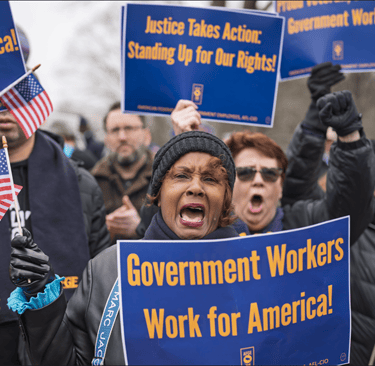 a woman holding a sign that says government workers
