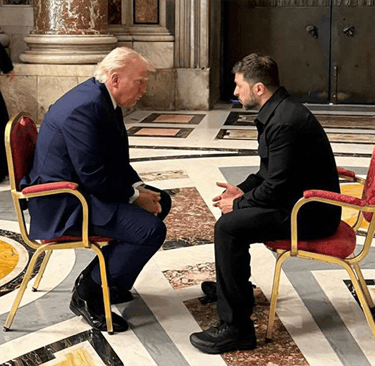 a man in a suit and a priest in a church