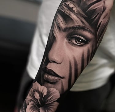 a tattoo style tattoo on the arm of a woman