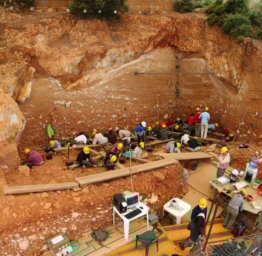 Scientist near the cave at the Sima del Elefante site