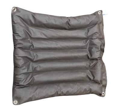 absorbent mat of grey porous geotextile with ridges. used for environment protection against oil spills chemical spills