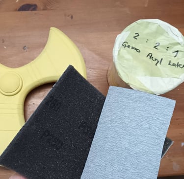painting a cosplay prop with basic color