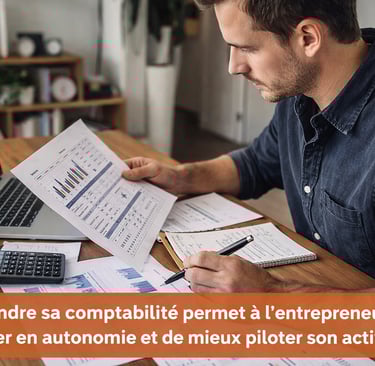 Entrepreneur analysant ses documents comptables pour gagner en autonomie financière