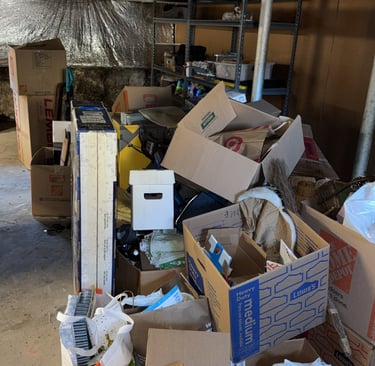 Basement clutter before junk removal cleanout project