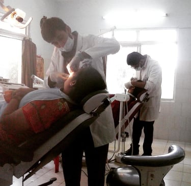 smeet performing a dental treatment on a patient