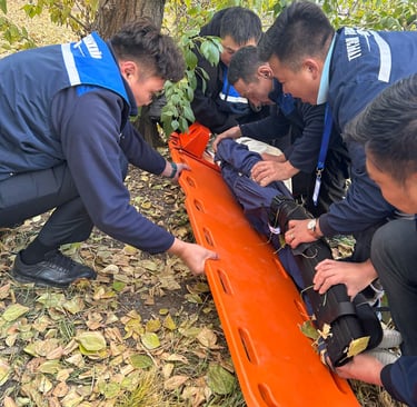 ambulance attendants practicing trauma management