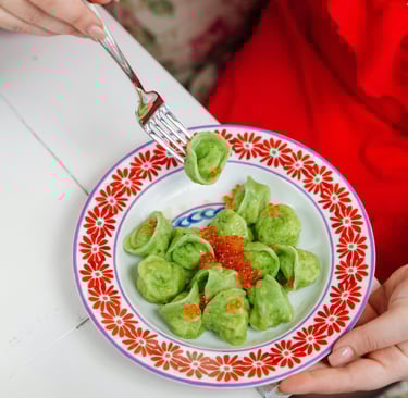 a person holding a fork and fork in their hands