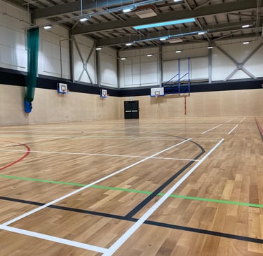 Whitley Bay HighSchool Refurbished Sports hall 600m2 Sanding Sealing and Lined