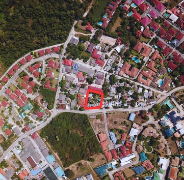 Aerial view of 1 Rai land plot in Pattaya with marked boundaries and surrounding residential neighbo