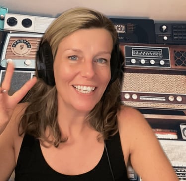 a woman with headphones and headphones on a wall