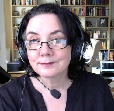 a woman with headphones and a headset on
