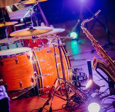 a saxophone player playing a saxophone and saxophone