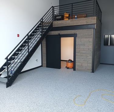 Stairs, Stair Rails, Railings, Mezzanine and Storage closet with Barn Door