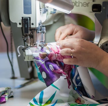 Men’s leggings and women’s leggings being printed, cut and sewn in the United States