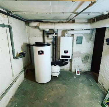 a tankless water heater in a basement