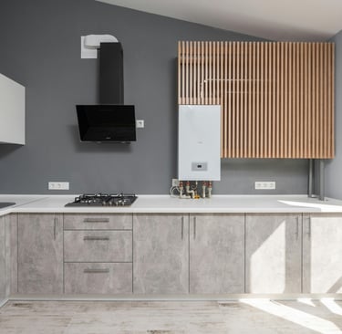 a kitchen with a stove top and a stove top