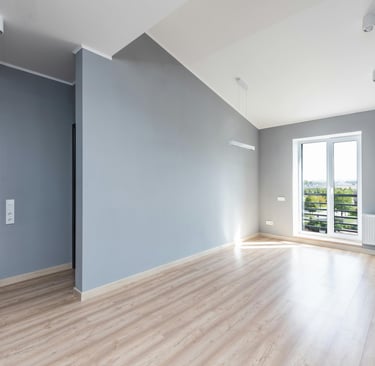 a room with a door and a door way to the outside