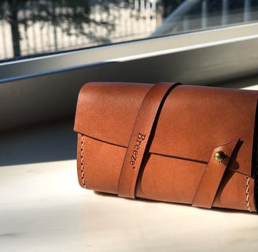 Premium handmade brown leather wallet with wrap strap and brass button