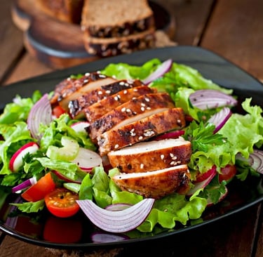 a plate of food with meat and vegetables